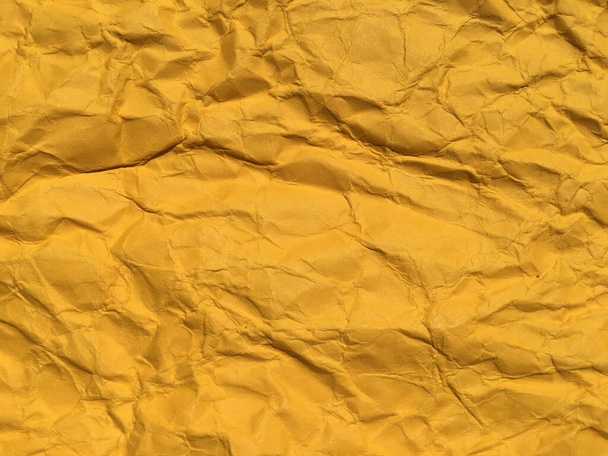Yellow wrinkled paper background for Design. Copy space for text or work  - Photo, Image