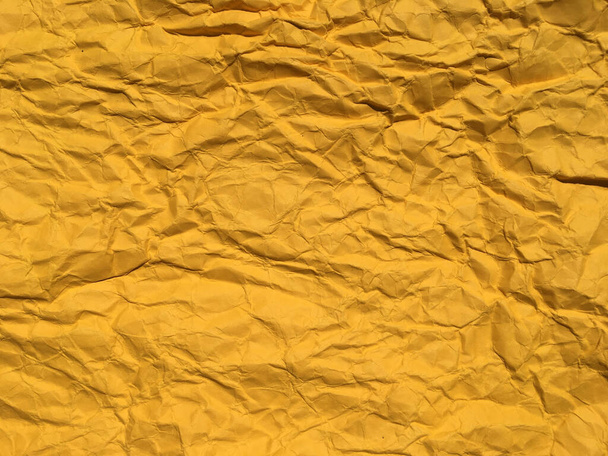 Abstract texture of yellow wrinkled paper background for Design. Copy space for text or work  - Photo, Image