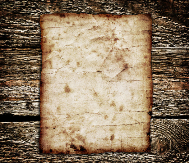 Old paper on the wood background - Foto, afbeelding