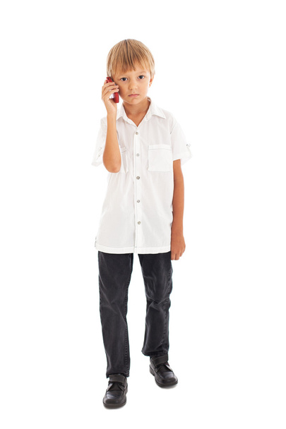 Boy holding a mobile phone - Фото, изображение