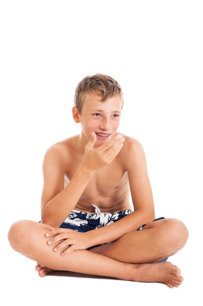 Boy wearing swimming shorts - Valokuva, kuva