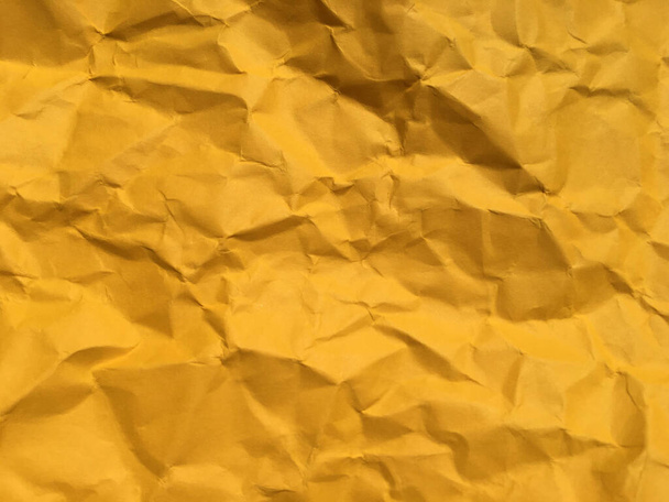 Abstract texture of yellow wrinkled paper background for Design. Copy space for text or work  - Photo, Image