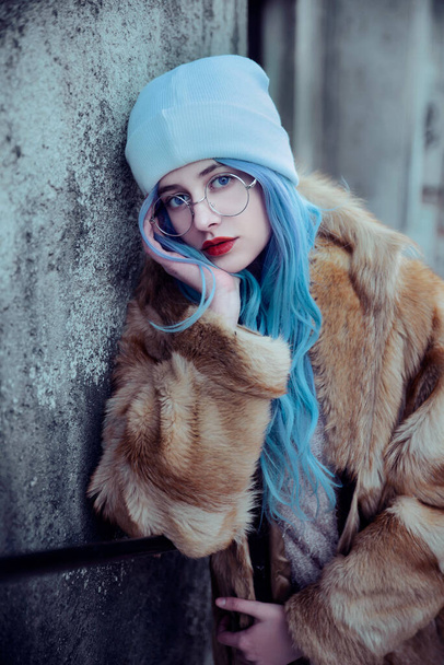 portrait of young beautiful woman with blue hair - Fotó, kép