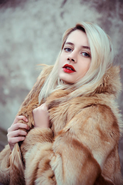 Young beautiful woman in fur coat  - Φωτογραφία, εικόνα
