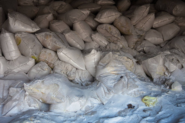 Pile of white sacks with synthetic fertilizer. - Photo, Image