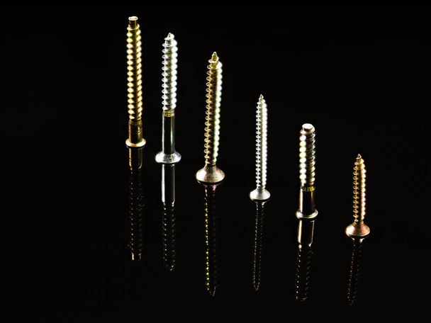 Screws and nuts of different types of threads - Valokuva, kuva