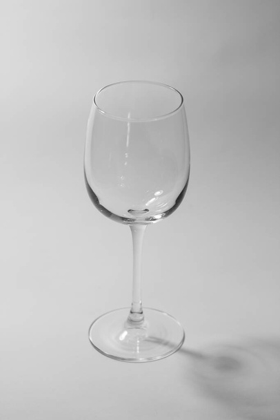 empty wine glass on gray background - Foto, immagini