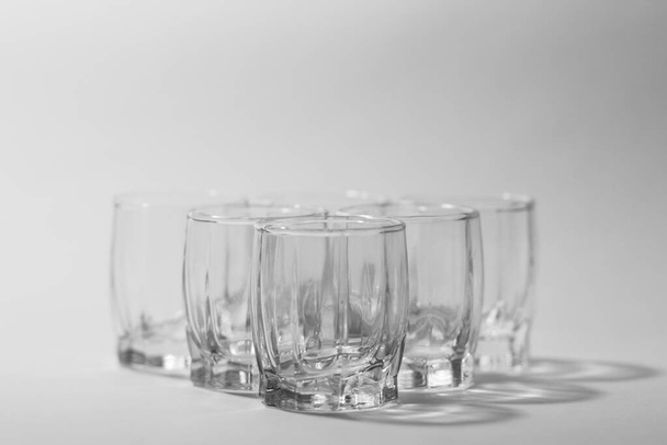 transparent glasses on a gray background - Foto, Bild