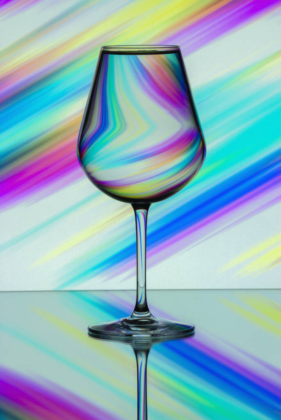 A glass of water faces a beautiful background - 写真・画像
