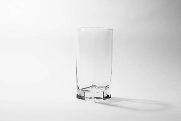 transparent glasses on a gray background - Foto, Imagem