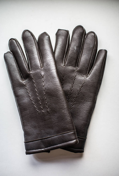black warming leather gloves - Zdjęcie, obraz