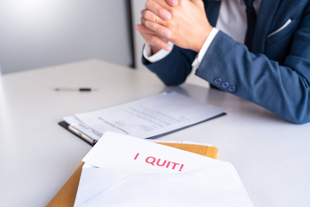 Businessman holding with I quit words card letter, resign employee Change of job concept - Foto, Imagen