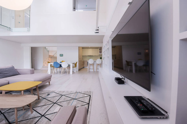 interior of a luxury stylish modern open space design two level apartment with white walls - Foto, Imagem