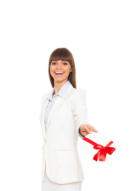 Business woman happy smile hold gift card present with red bow. - Fotó, kép