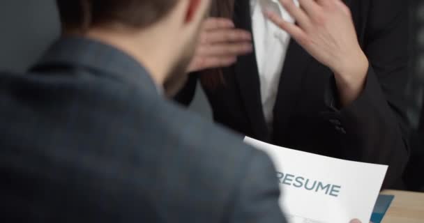 Close up of male employer reviewing resume application - Video, Çekim