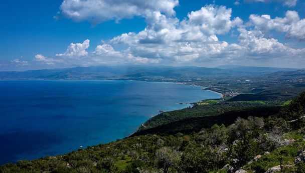 Green mountainous coast of the Mediterranean Sea on the Akamas Peninsula in the northwest of the island of Cyprus. - Photo, image