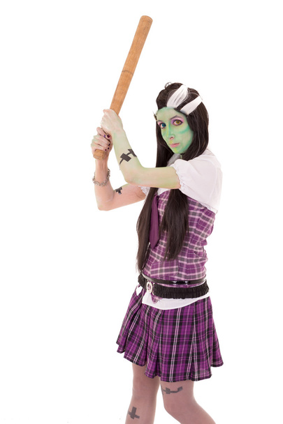 Woman in Frankenstein costume with bat - Фото, зображення