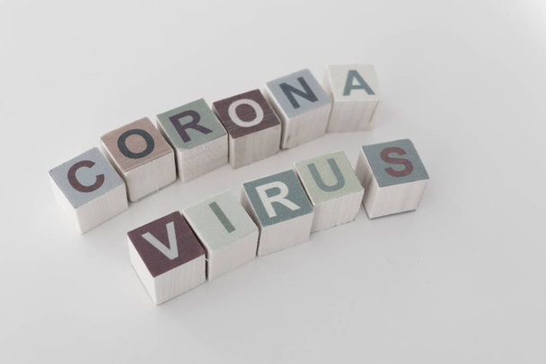 Coronavirus Game CUbe Letters on a White Background - Valokuva, kuva