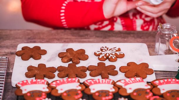 Step by step. Decorating gingerbread cookies with royal icing. - Photo, Image