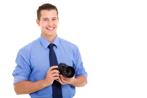 young photographer on white background - Foto, Bild