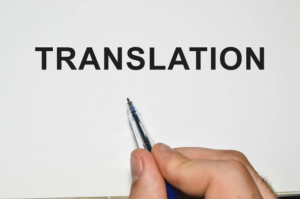 Translation word written on white paper - Фото, изображение