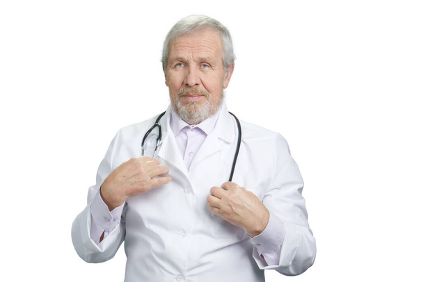 Old physician with stethoscope portrait. - Photo, Image
