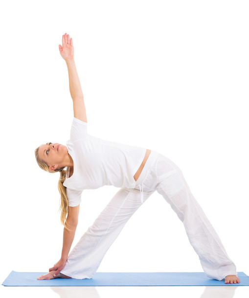 fit middle aged woman yoga pose - Fotó, kép