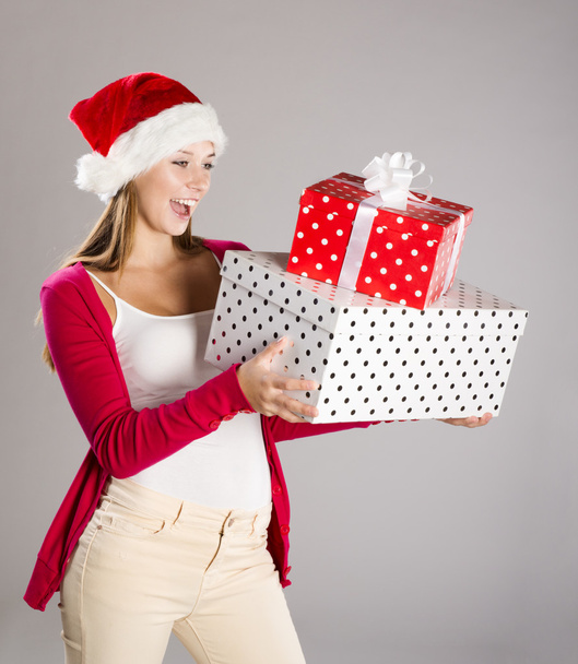 Beautiful christmas woman with gift - Foto, imagen