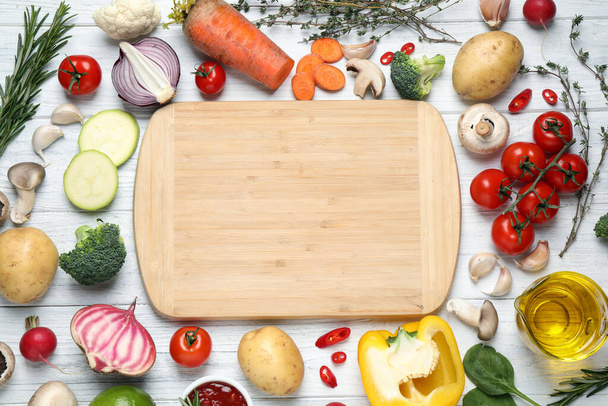 Flat lay composition with fresh products on white wooden table, space for text. Healthy cooking - Fotoğraf, Görsel