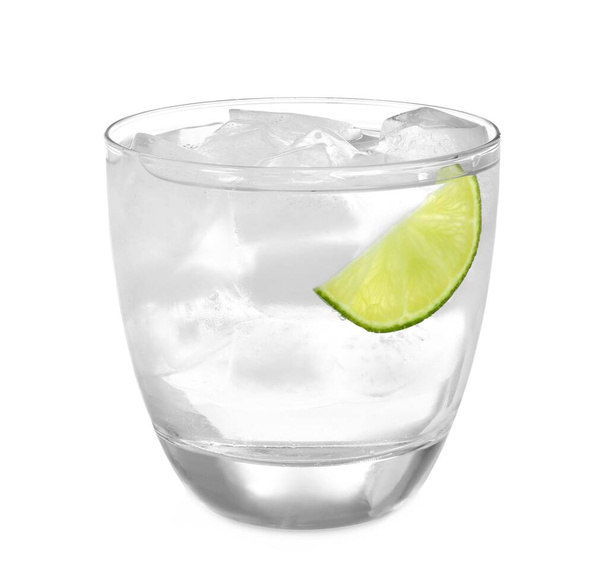 Glass of refreshing drink with ice cubes on white background - Fotó, kép