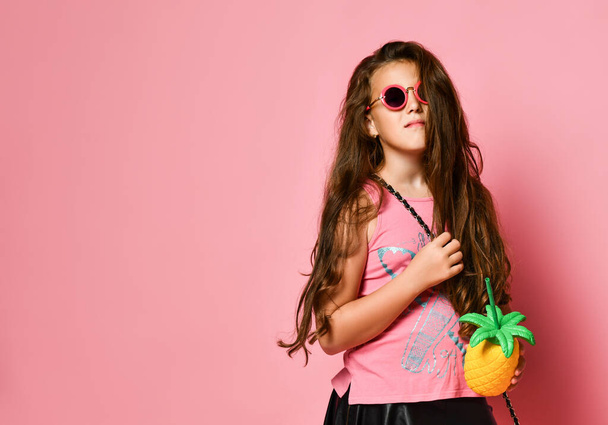 Portrait of young plus size girl model in stylish summer casual clothing and accessories holding healthy diet cocktail in hand - 写真・画像