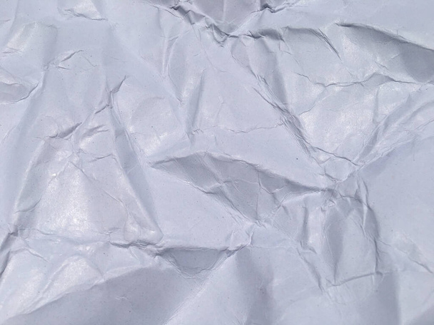 Top view of white crumpled paper texture background. Copy space for design and artwork - Photo, Image