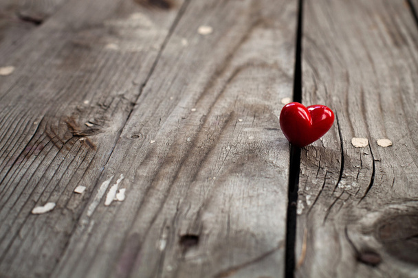 Heart on wooden surface - Foto, imagen
