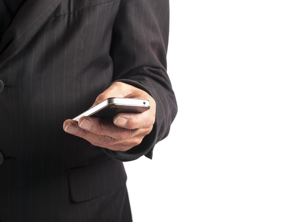 Uomo d'affari con smart phone in mano
 - Foto, immagini