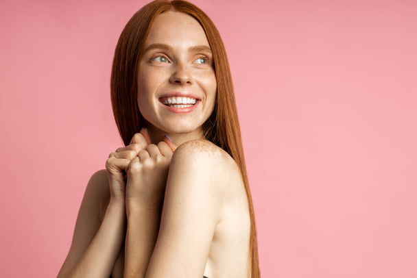 Beautiful spa woman with perfect fresh freckled skin - 写真・画像