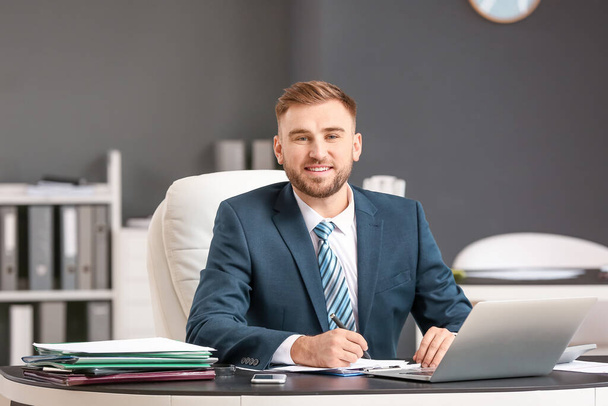 Male accountant working in office - Photo, image