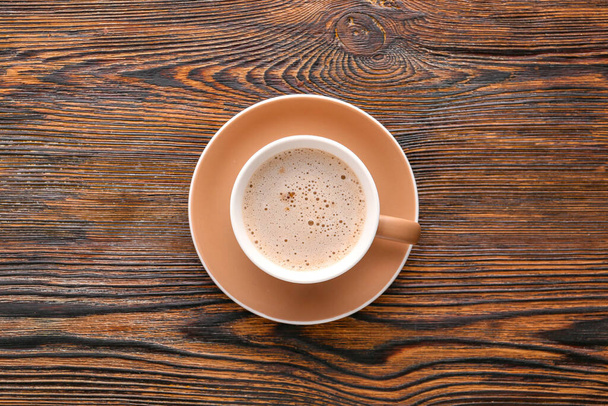 Cup of hot coffee on wooden table - Photo, Image