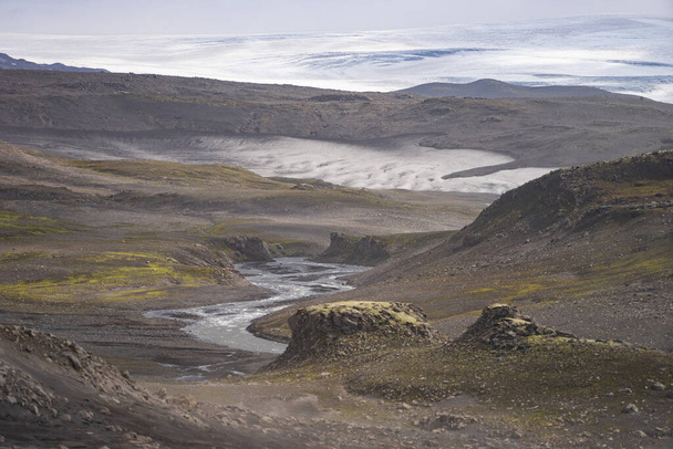 Volcanic landscape with glacier, rocks and ash on the Fimmvorduhals hiking trail. Iceland - Photo, Image