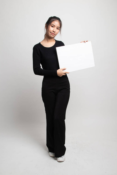 Full body of young Asian woman with white blank sign on white background - Photo, Image