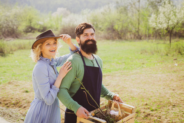 Couple of Gardeners with garden tools. Gardening agriculture and people concept. - Foto, imagen