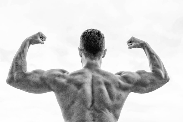 Achieve success. Successful athlete. Victory and success. Champion and winner concept. Sport motivation. Man celebrating success. Bodybuilder strong muscular back feeling powerful and superior - Foto, imagen