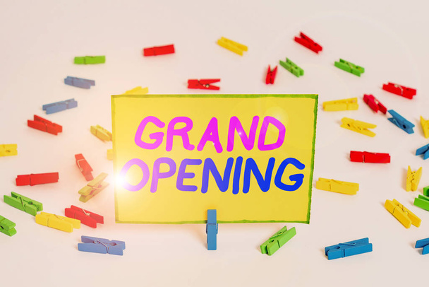 Writing note showing Grand Opening. Business photo showcasing held to mark the opening of a new business or public place Colored clothespin papers empty reminder white floor background office. - Φωτογραφία, εικόνα