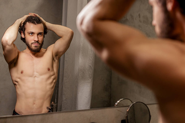 sexy man with perfect body in bathroom - Foto, Bild