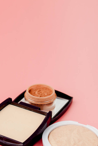 Tonal foundation and highlighter, base for make-up in the form of a cushion. Highlighter powder cosmetic product top view. - Foto, immagini