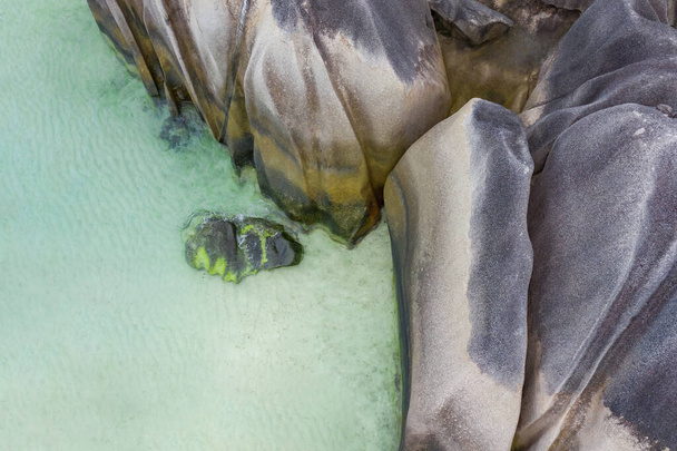 Rocks of tropical coastline and blue ocean. Seychelles islands - Fotó, kép