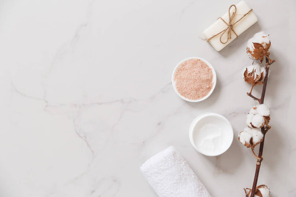 Spa cosmetics set on white marble background from above. Beauty blogger concept. Copy space - Foto, Imagem