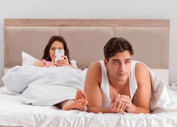 Family conflict with wife husband in bed - Photo, Image