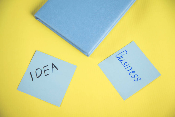 idea and business text on paper with notepad - Photo, image