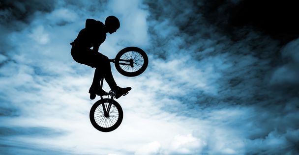 Bmx bike over blue sky background. - Фото, изображение