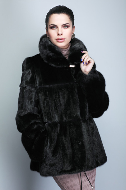 A photo of sexual beautiful girl is in fur clothes - Фото, зображення